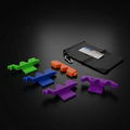 Endless Cue Holder expandable pool cue rack modules in green, blue, orange, and purple — 3D-printed interlocking billiard cue holders with LH Inventions carry bag and carabiner